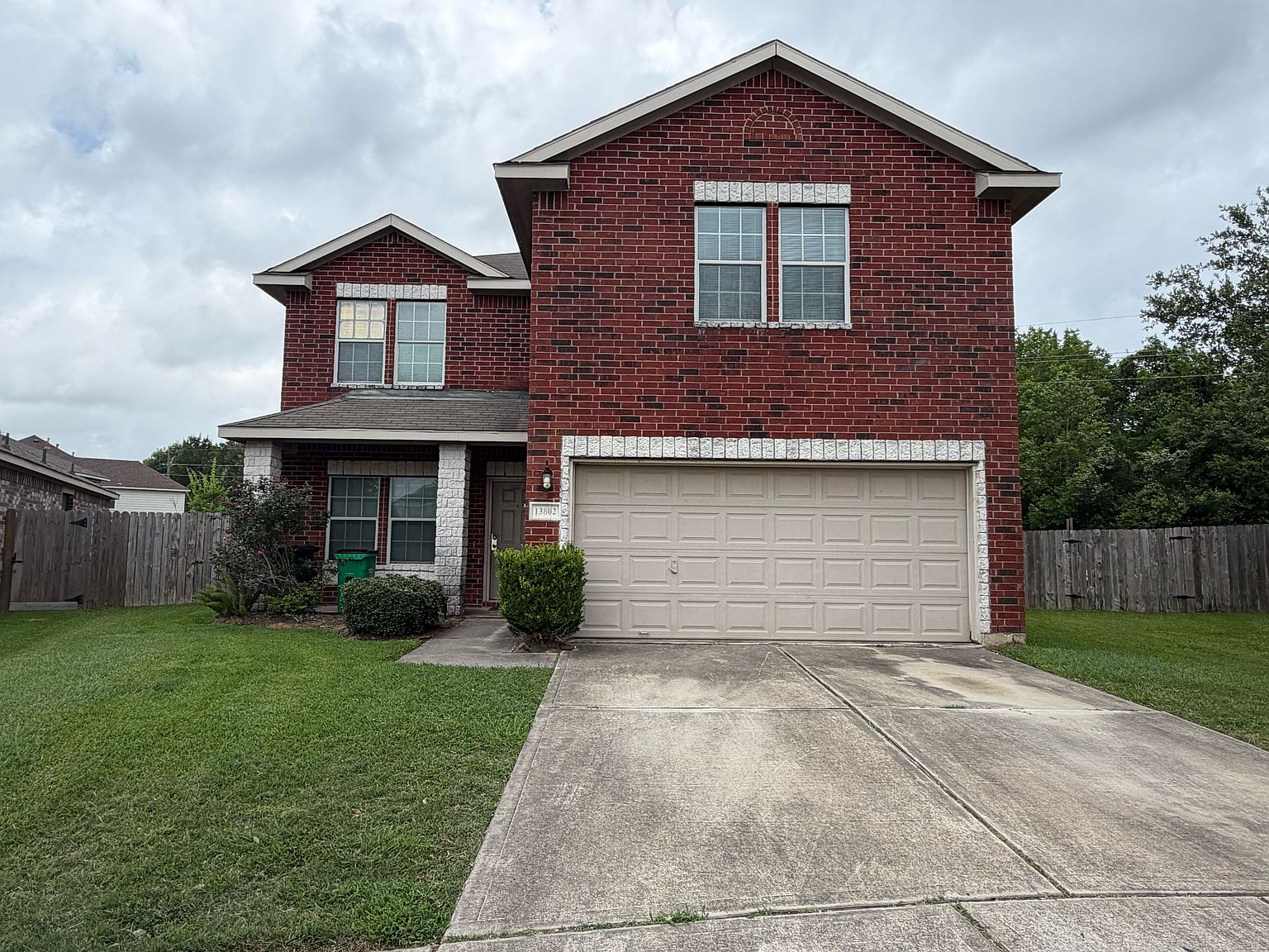 Brick two-story exterior with attached garage